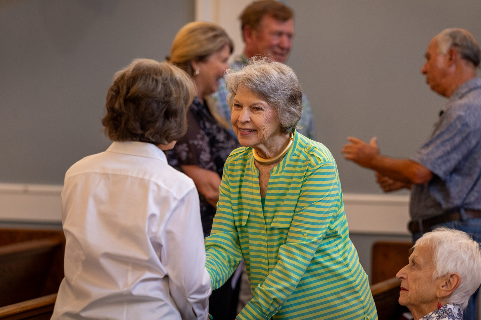 Friends visiting after worship