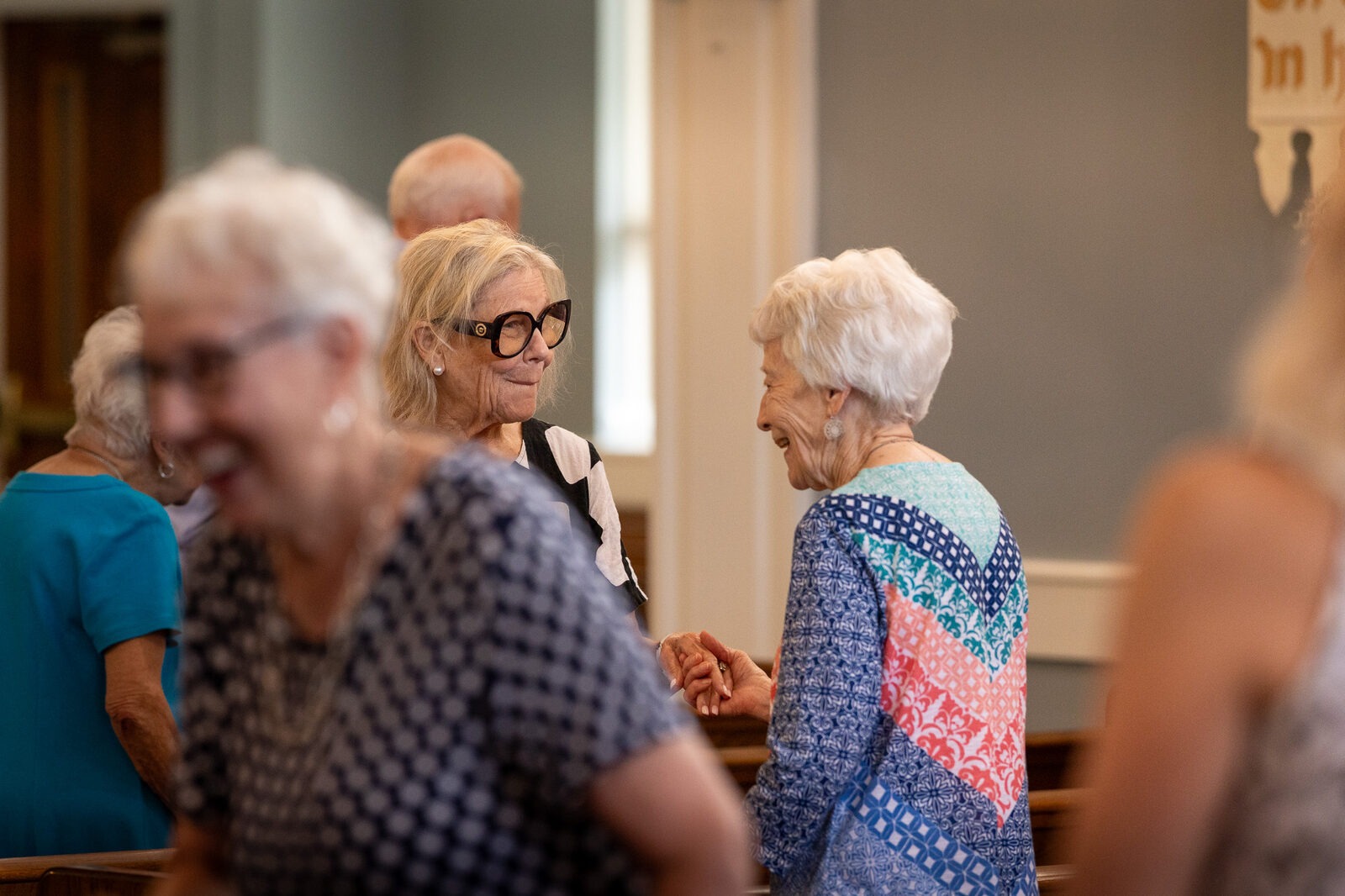 Laughter and conversation after the service