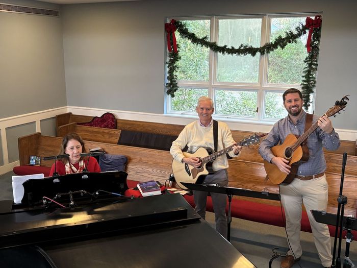 Caroling together at Christmas