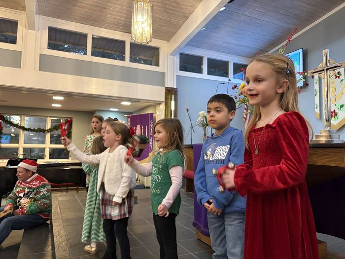 Children caroling at Christmas