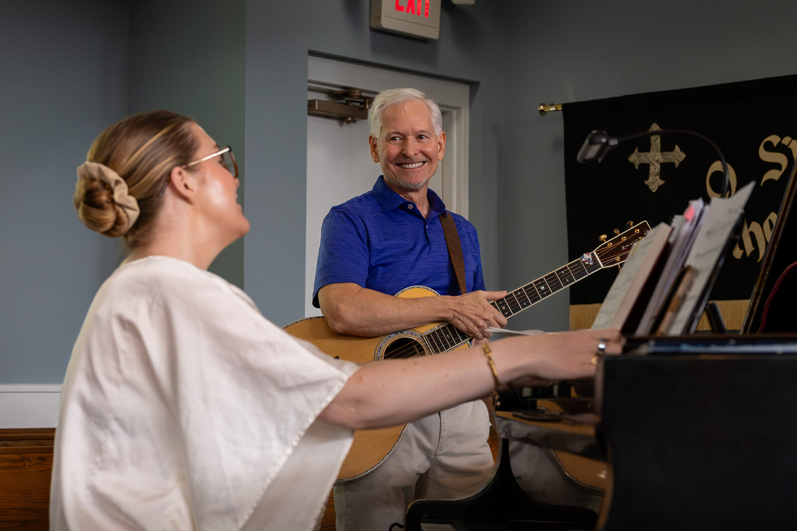 Playing guitar in worship